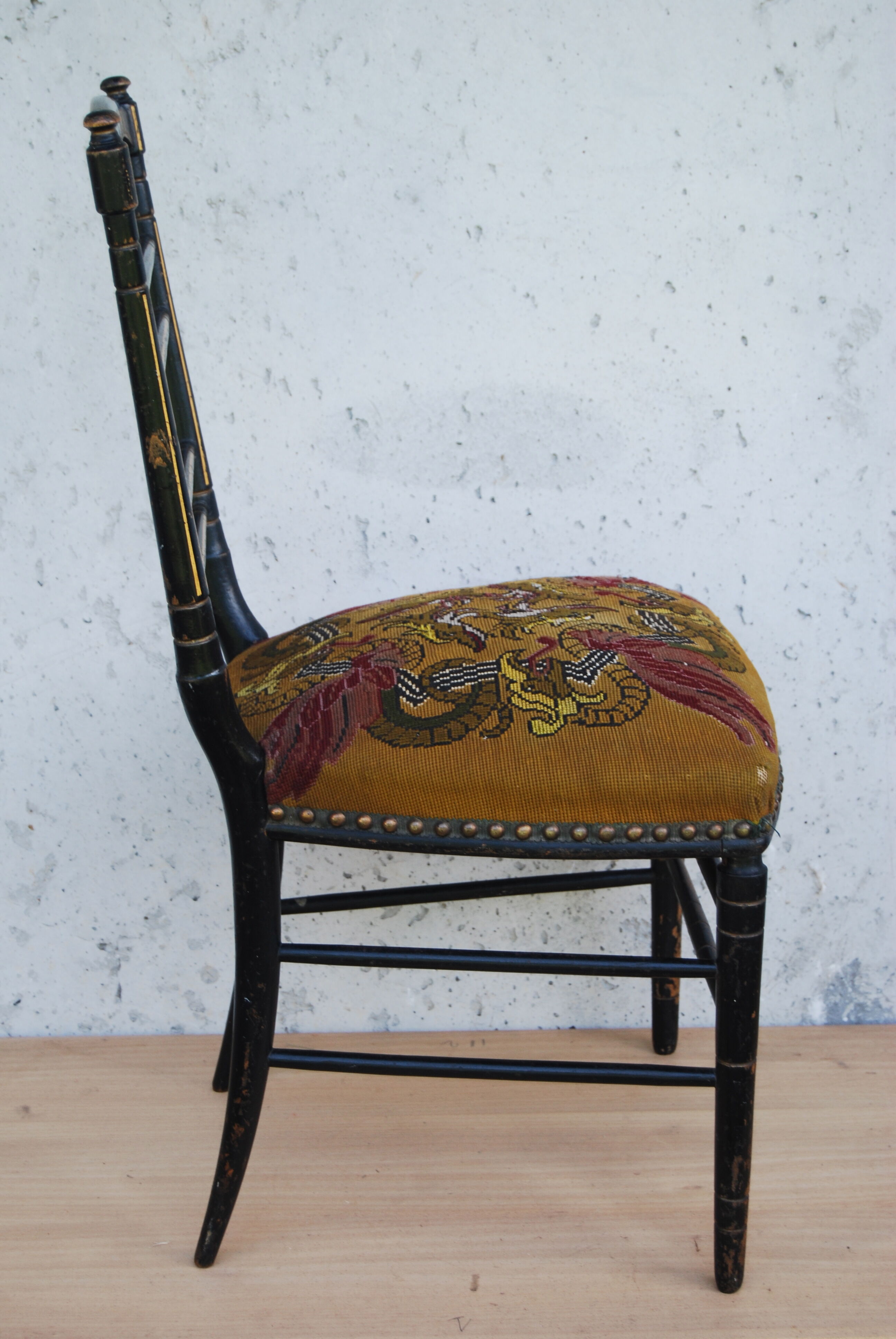 Napoleon III chair in blackened wood and golden fillets 19th.
