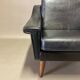 Black leather armchair "Scandinavian design" 1950.