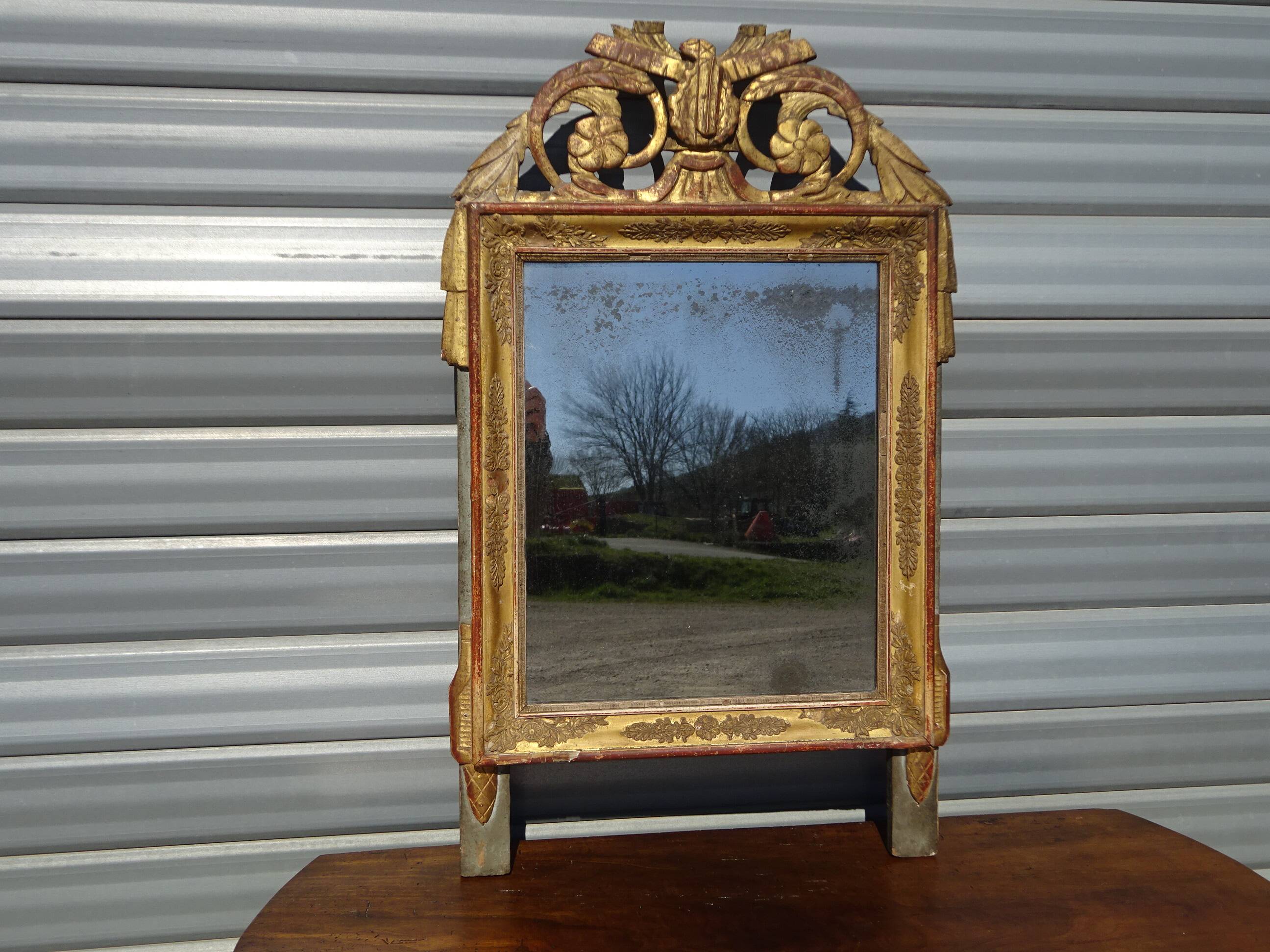 Very old Louis XVI style mirror.