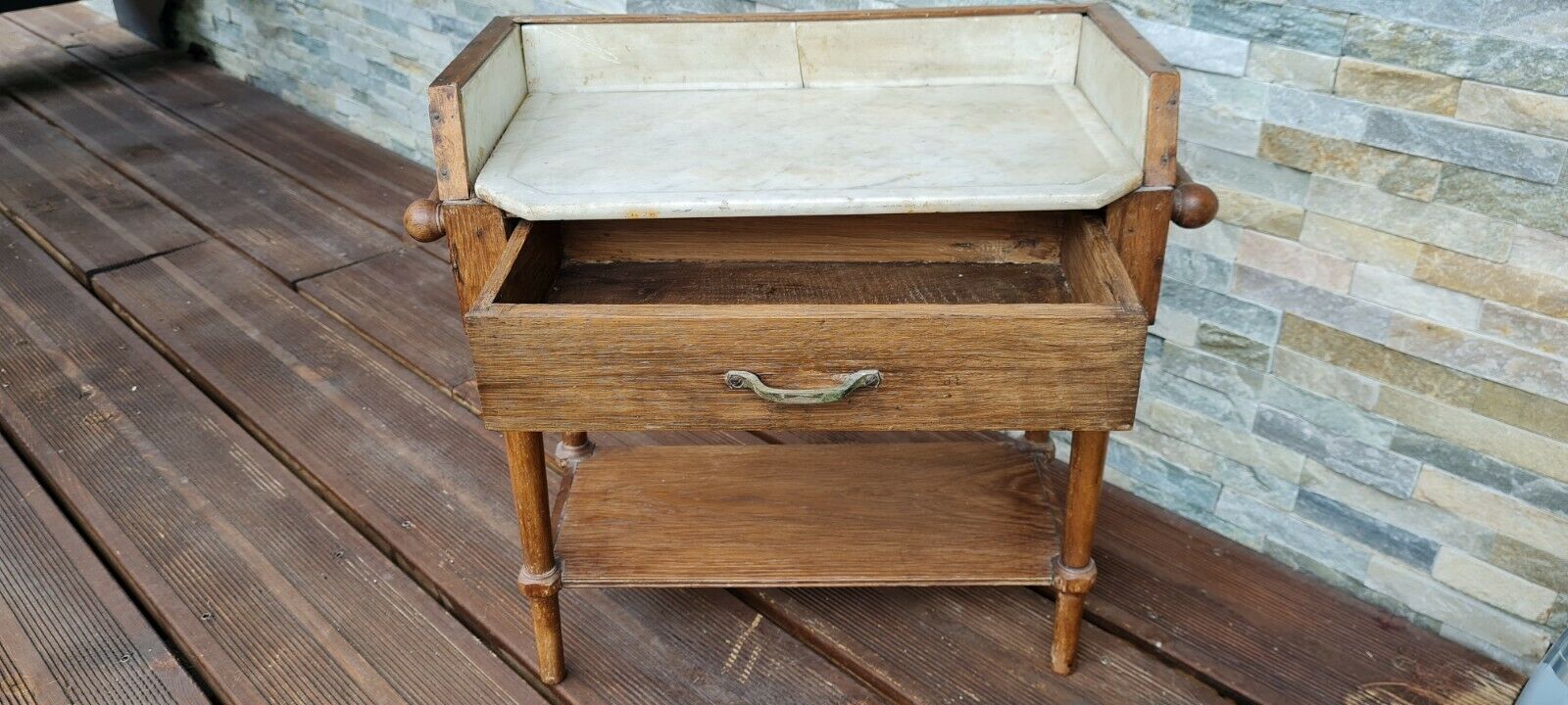 Old wooden children's toilet table and marble top