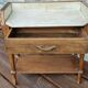 Old wooden children's toilet table and marble top