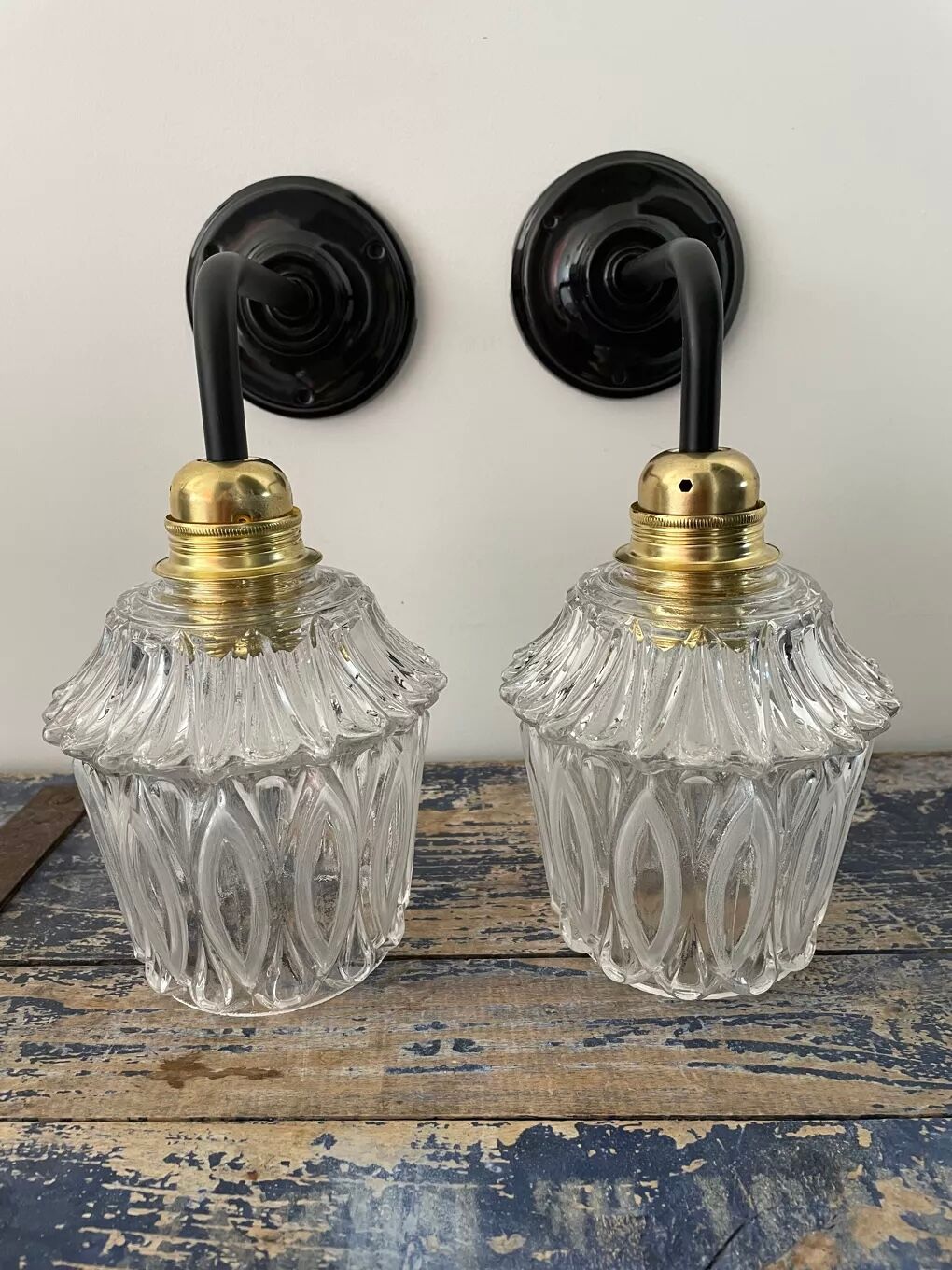 Pair of vintage electrified glass wall lamps