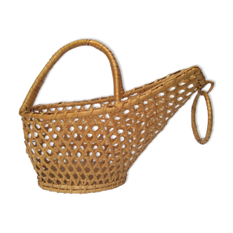 Vintage bottle holder in canned rattan