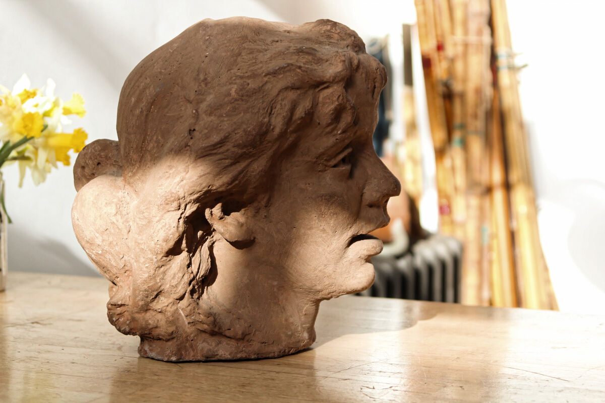 Woman's head, reconstituted stone