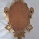 Miroir en bois et doré à la feuille doré