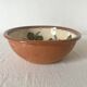Terracotta salad bowl with flower decoration