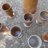 Service mazagrans and decanter in enamelled stoneware.