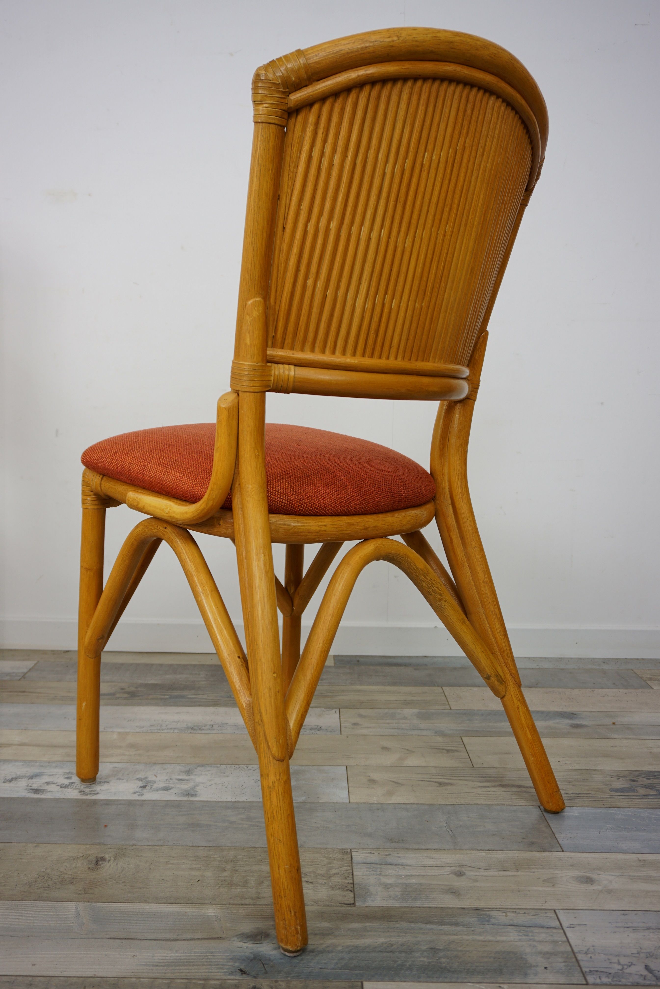 Suite of 4 chairs in Italian rattan design from the 60/70