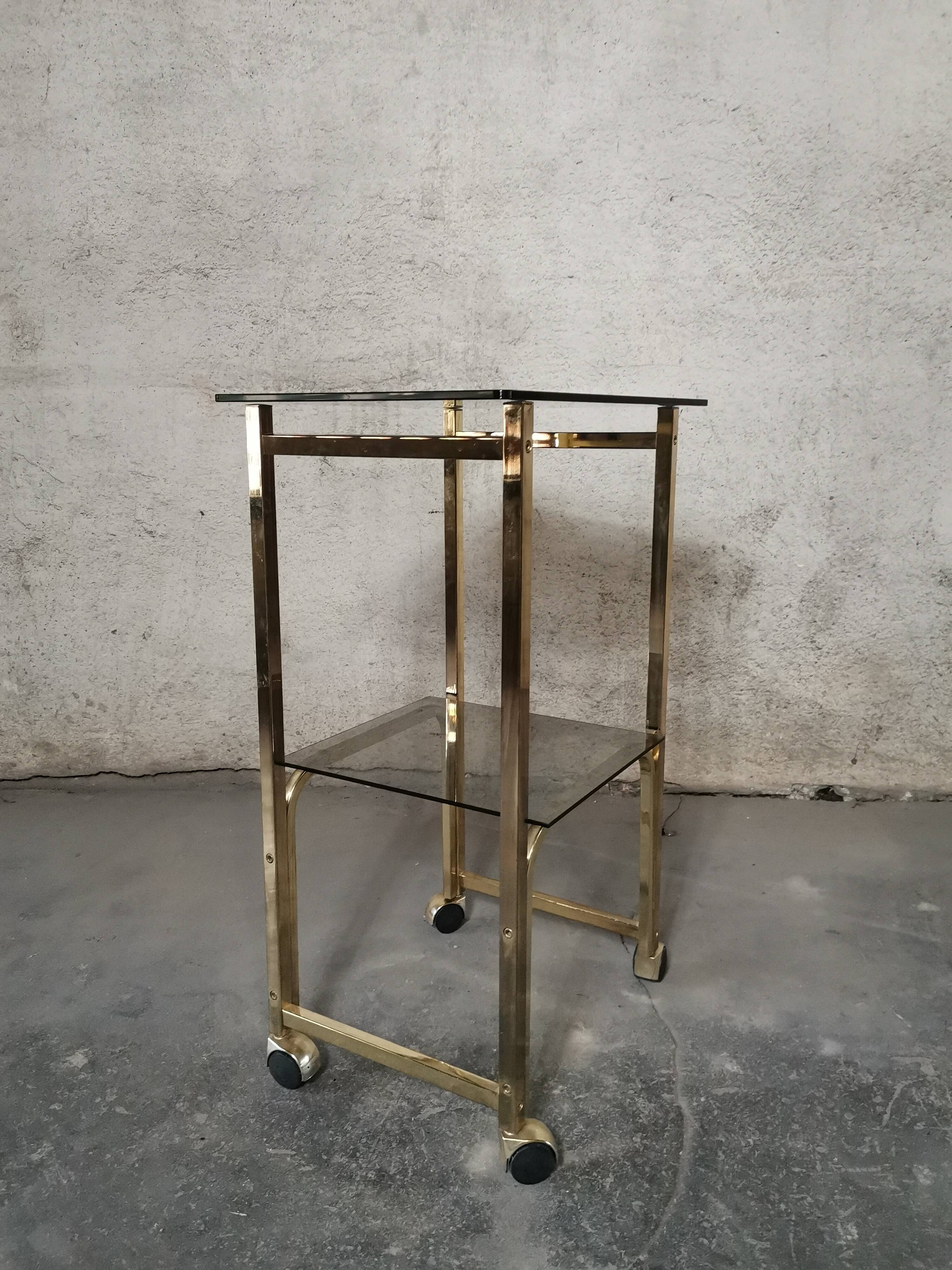 Side Table 1970s smoked glass/gold/wheels