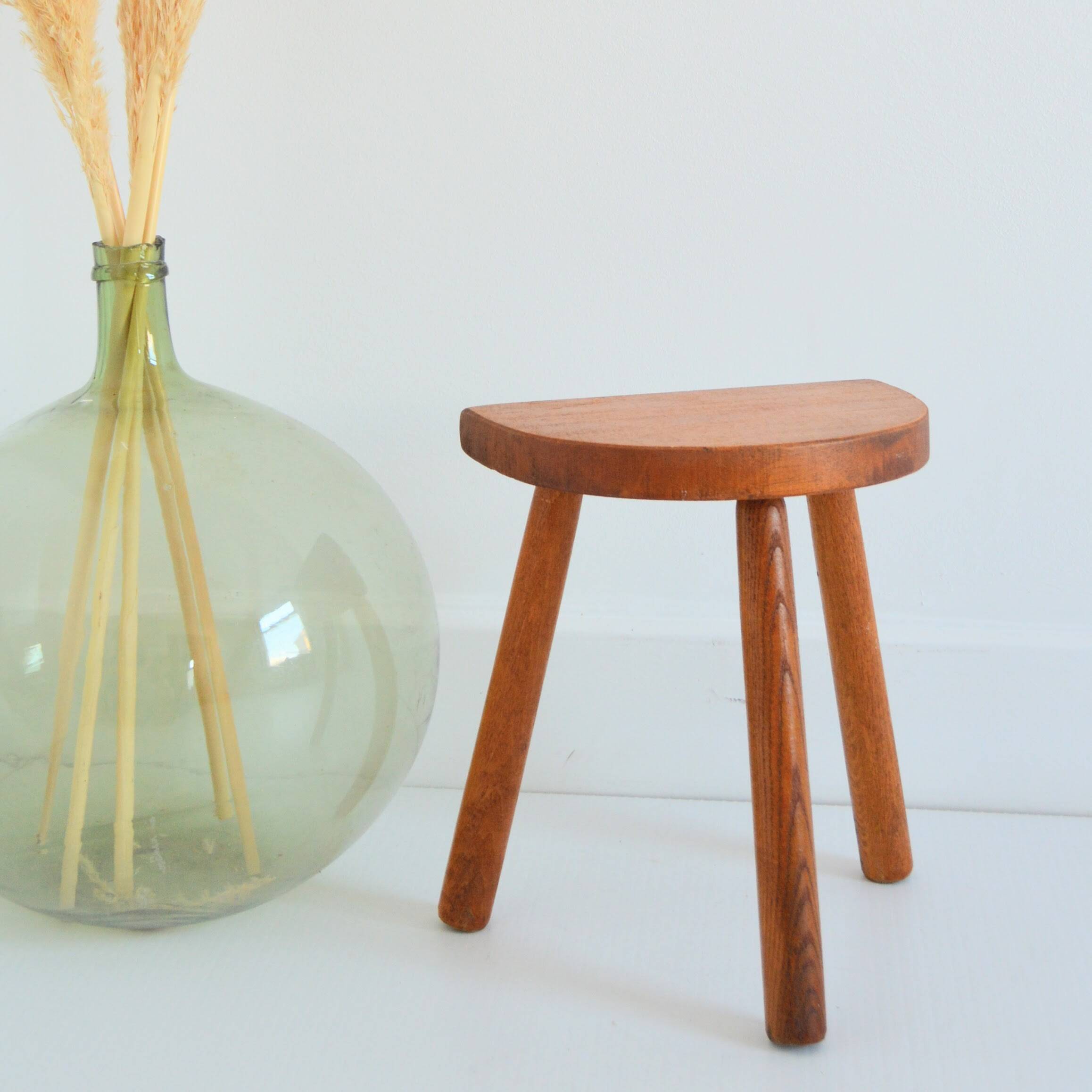 Antique brutalist wooden stool