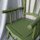 Green children's chair in turned wood