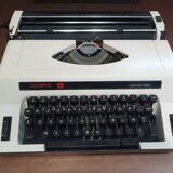 Olympia Alphamatic typewriter with Notice