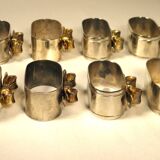 8 silver and gold napkin rings