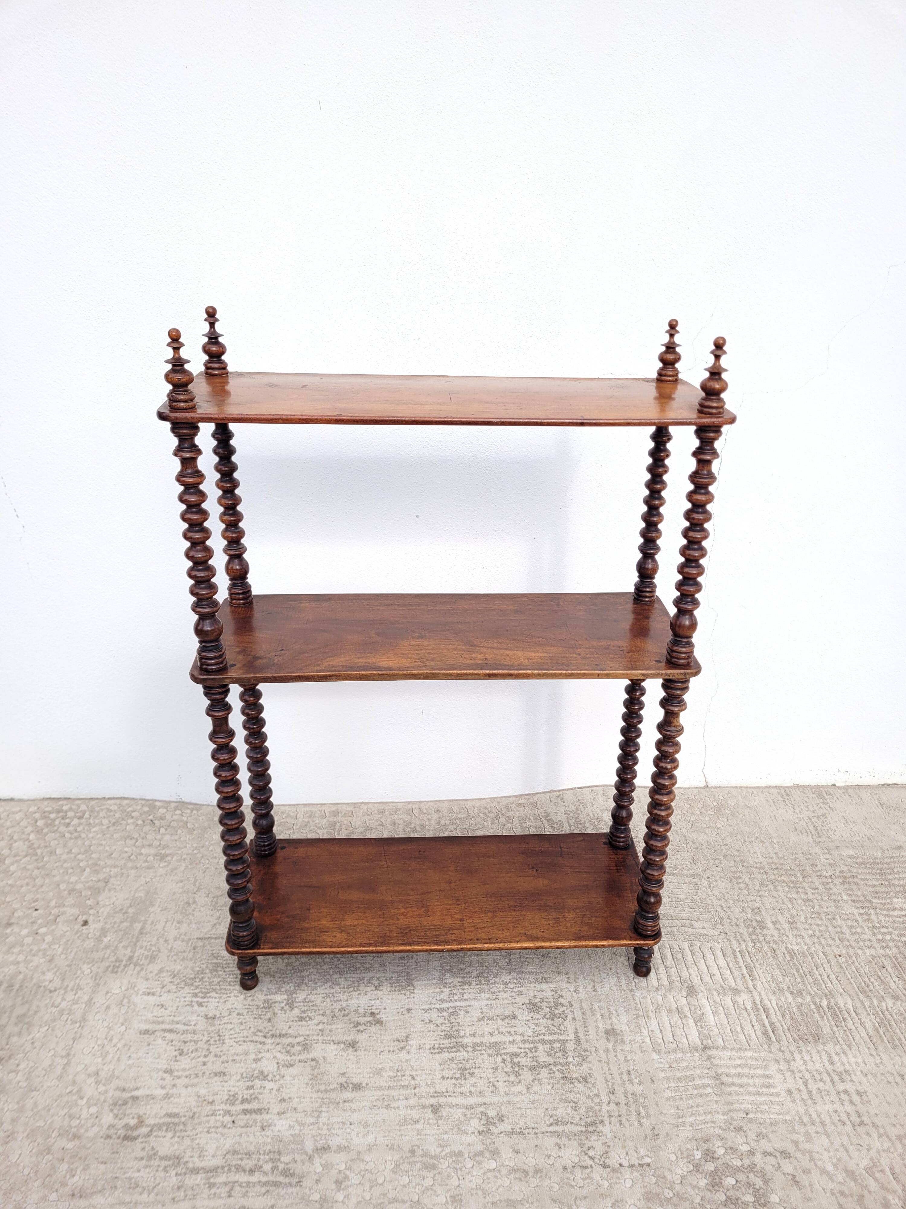 19th century shelf with walnut rosary