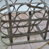 Old metal bottle holder