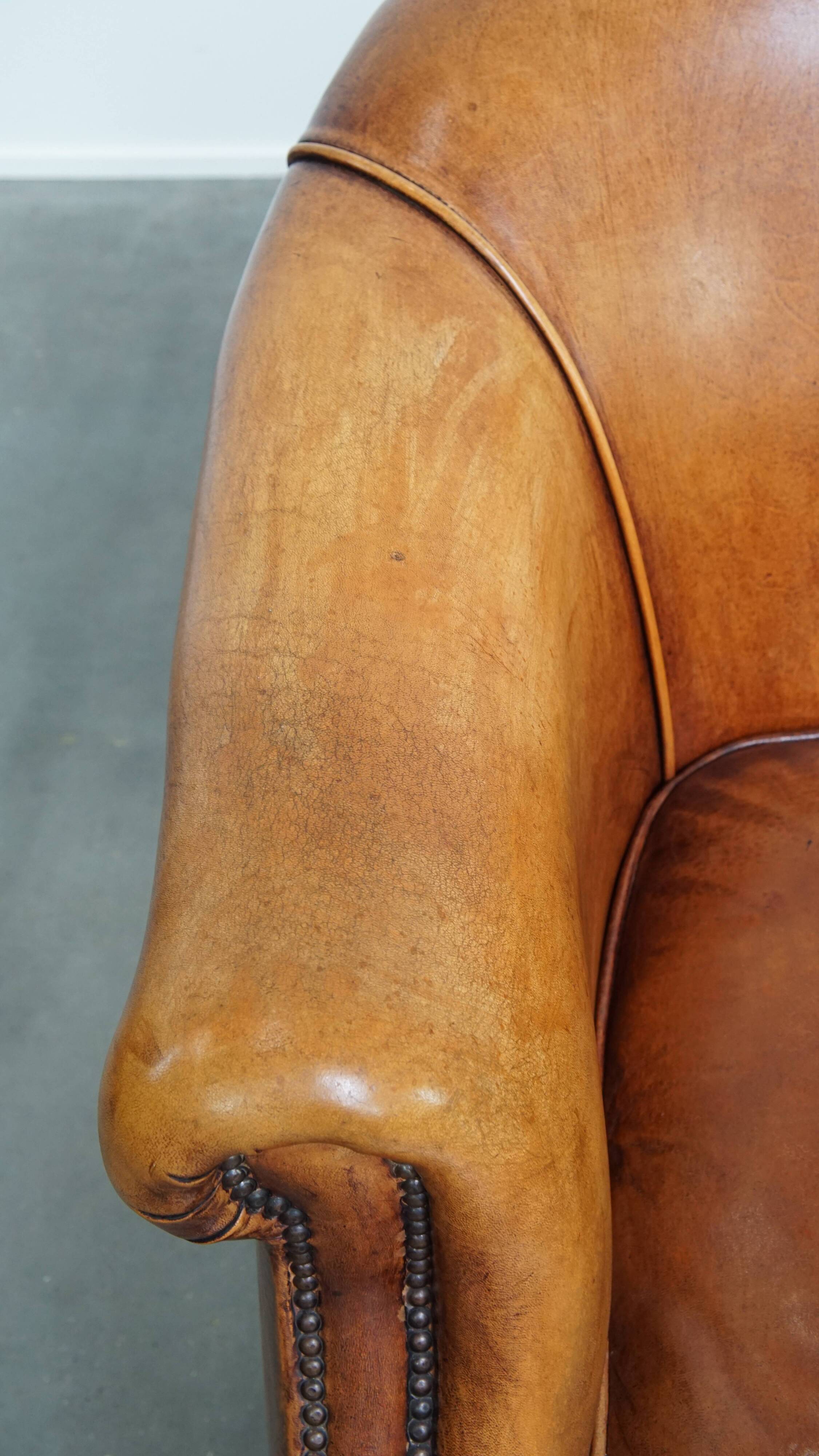 Ensemble de 2 fauteuils club en cuir de mouton