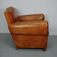 Vintage french moustache back cognac-colored leather club chair