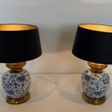 Pair of porcelain lamps with Chinese-style decorations and brass.