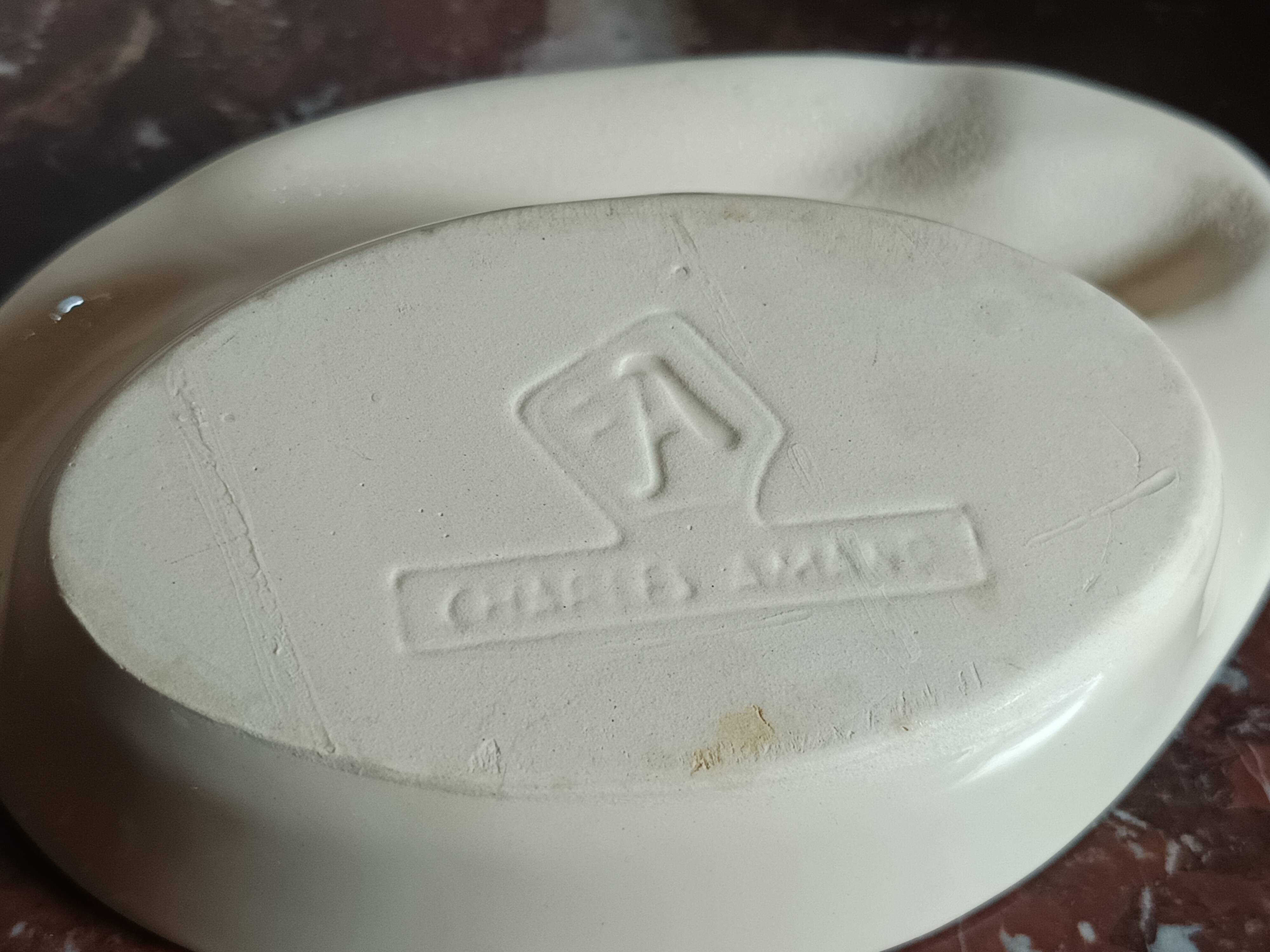 Two vintage Charles Amand ramekins