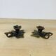 Pair of brass flower candlesticks, cellar