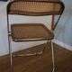 2 plia rattan chairs by piretti