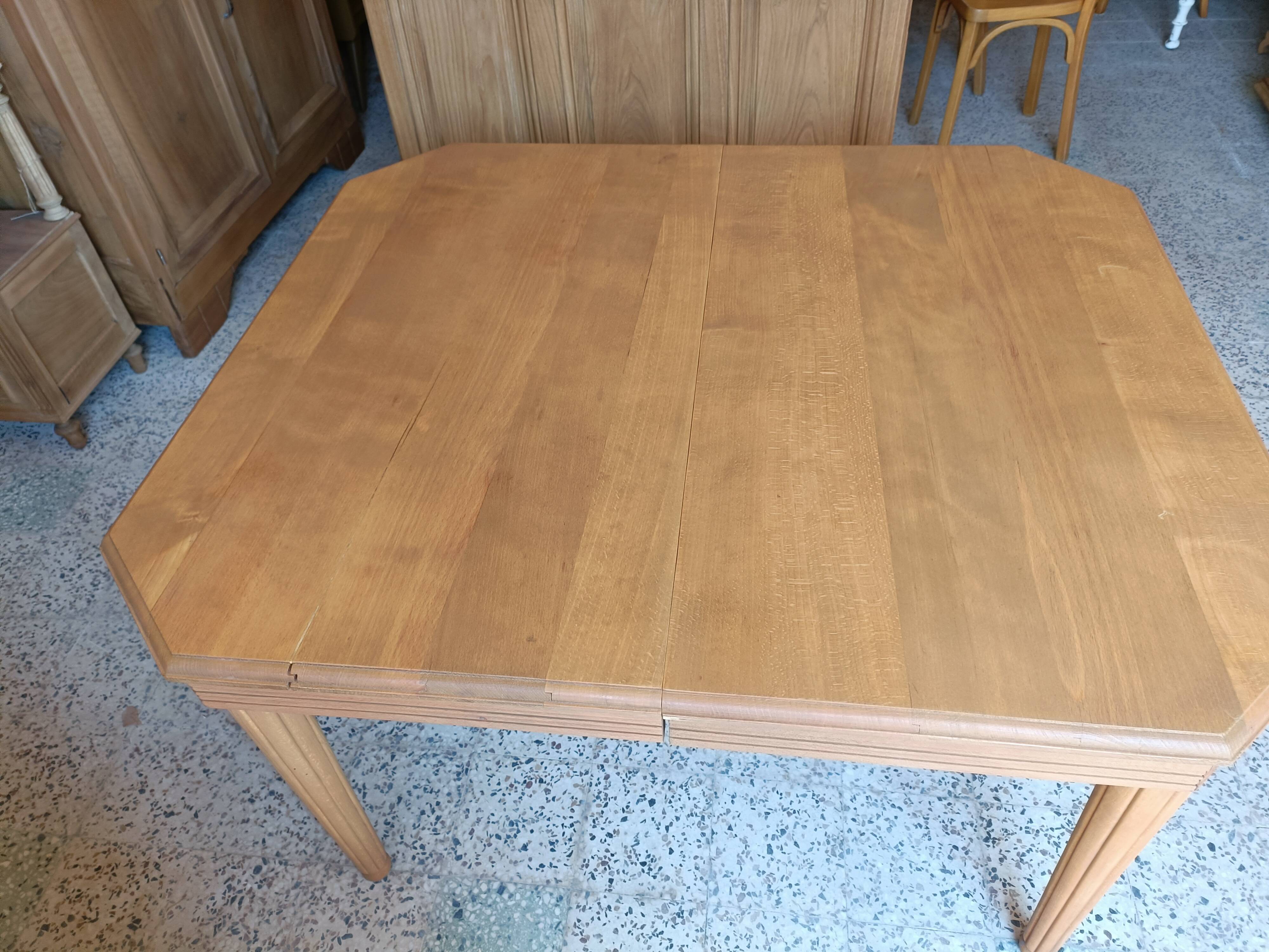 Renovated Art Deco table with 3 extensions.