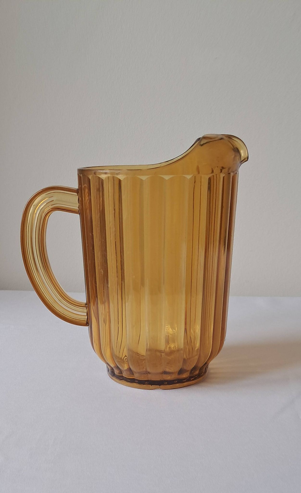 Vintage amber polycarbonate jug