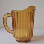 Vintage amber polycarbonate jug