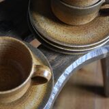 4 sandstone cups and saucers