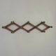 Vintage accordion coat rack