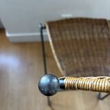 Chaise en métal et osier