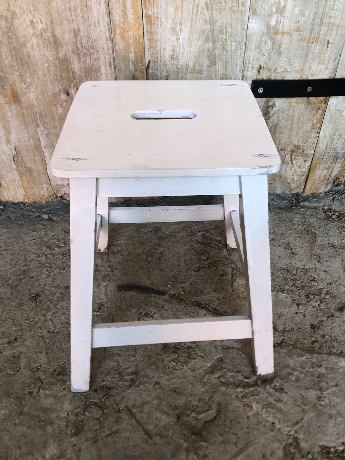 Vintage white wood milking stool