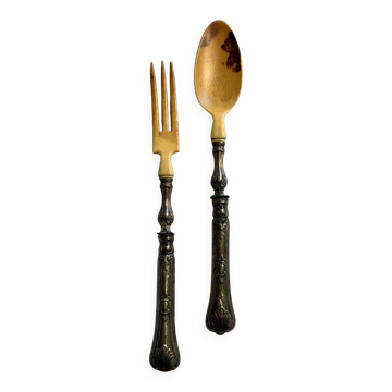 Filled silver salad servers