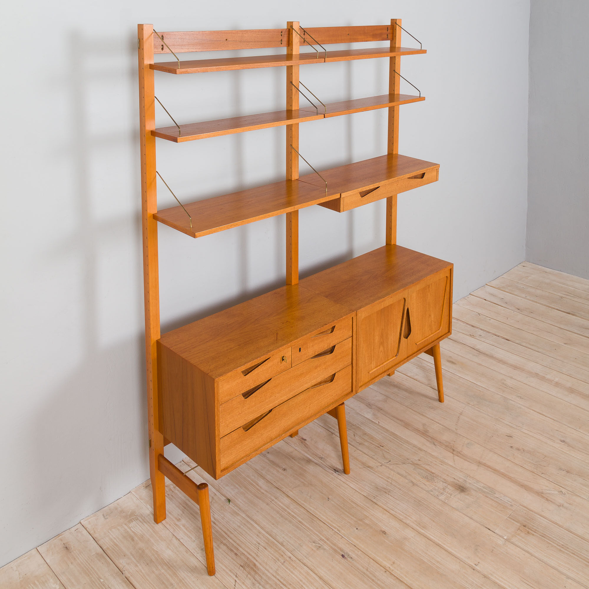 Rival 2 bay teak wall unit with 3 cabinets and 5 shelves by Brodrene Jatogs Norway, Kjell Riise, 196