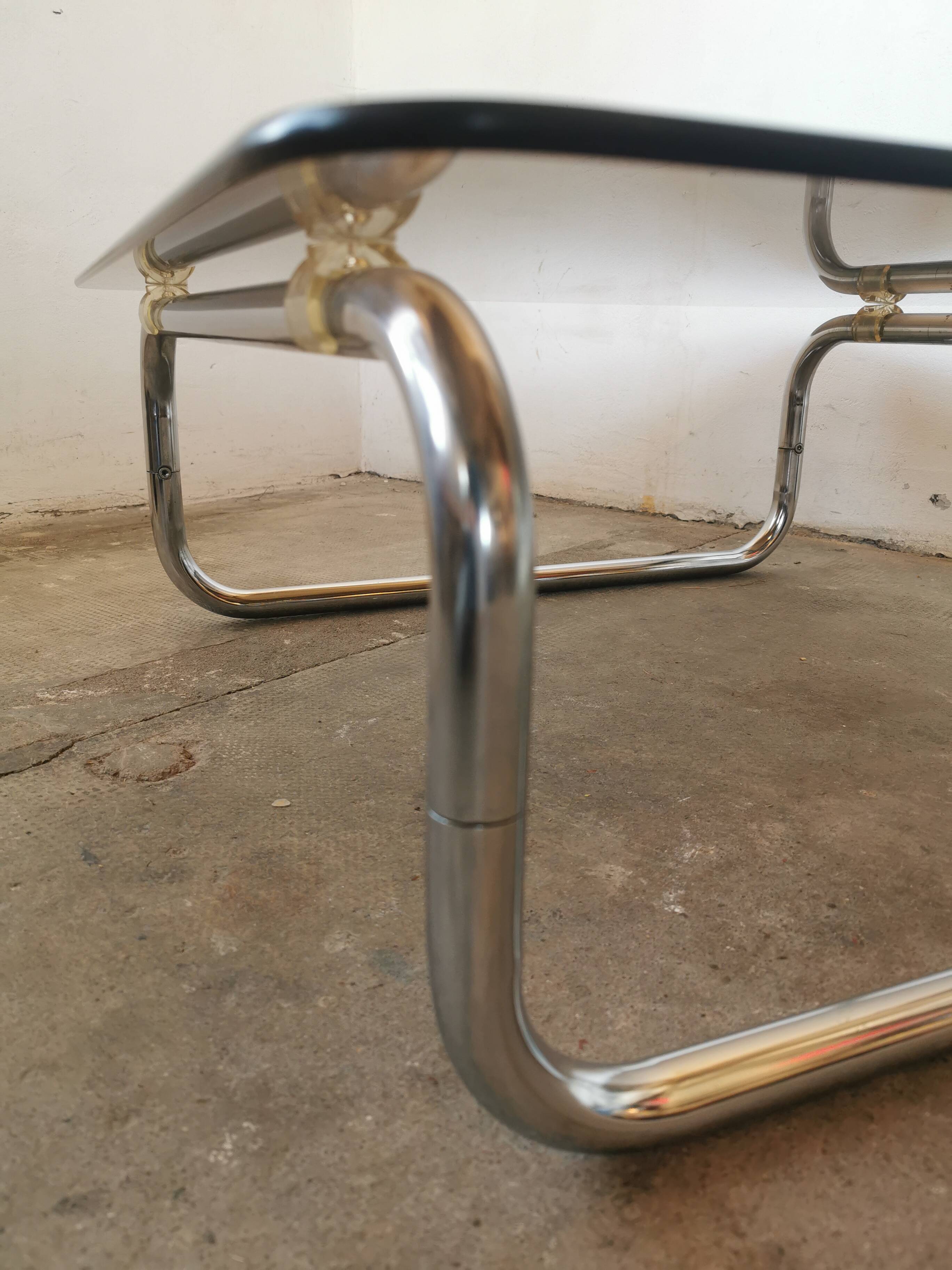 Chrome tubular metal and smoked glass coffee table