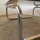 Chrome tubular metal and smoked glass coffee table