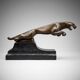 Large Art Deco bronze patinated Jaguar sculpture on an architectural base.