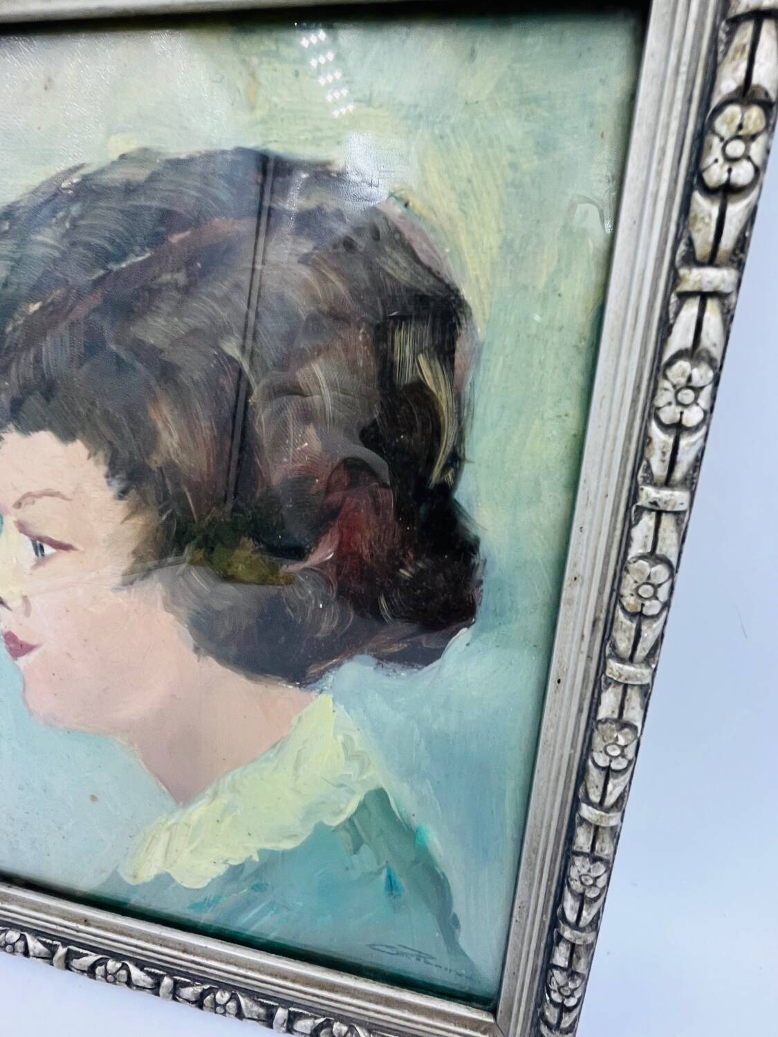 Painting head of a woman signed