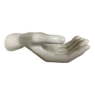 Coat hook representing a hand
