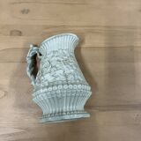 Antique embossed wine pitcher