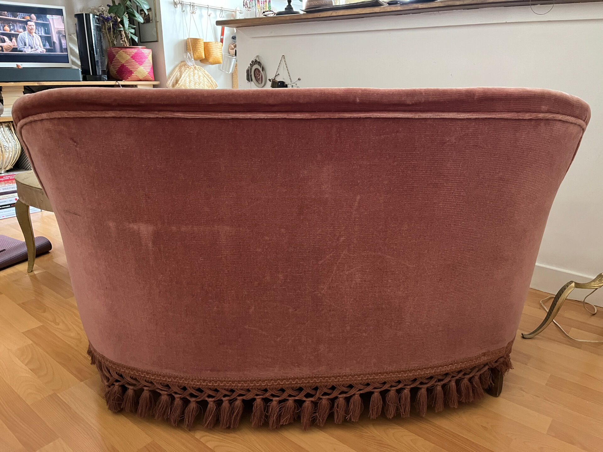 Pink velvet tufted sofa