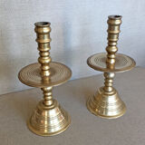 Pair of bronze church candle holders