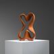 Sculpture abstraite avec des courbes organiques fluides.