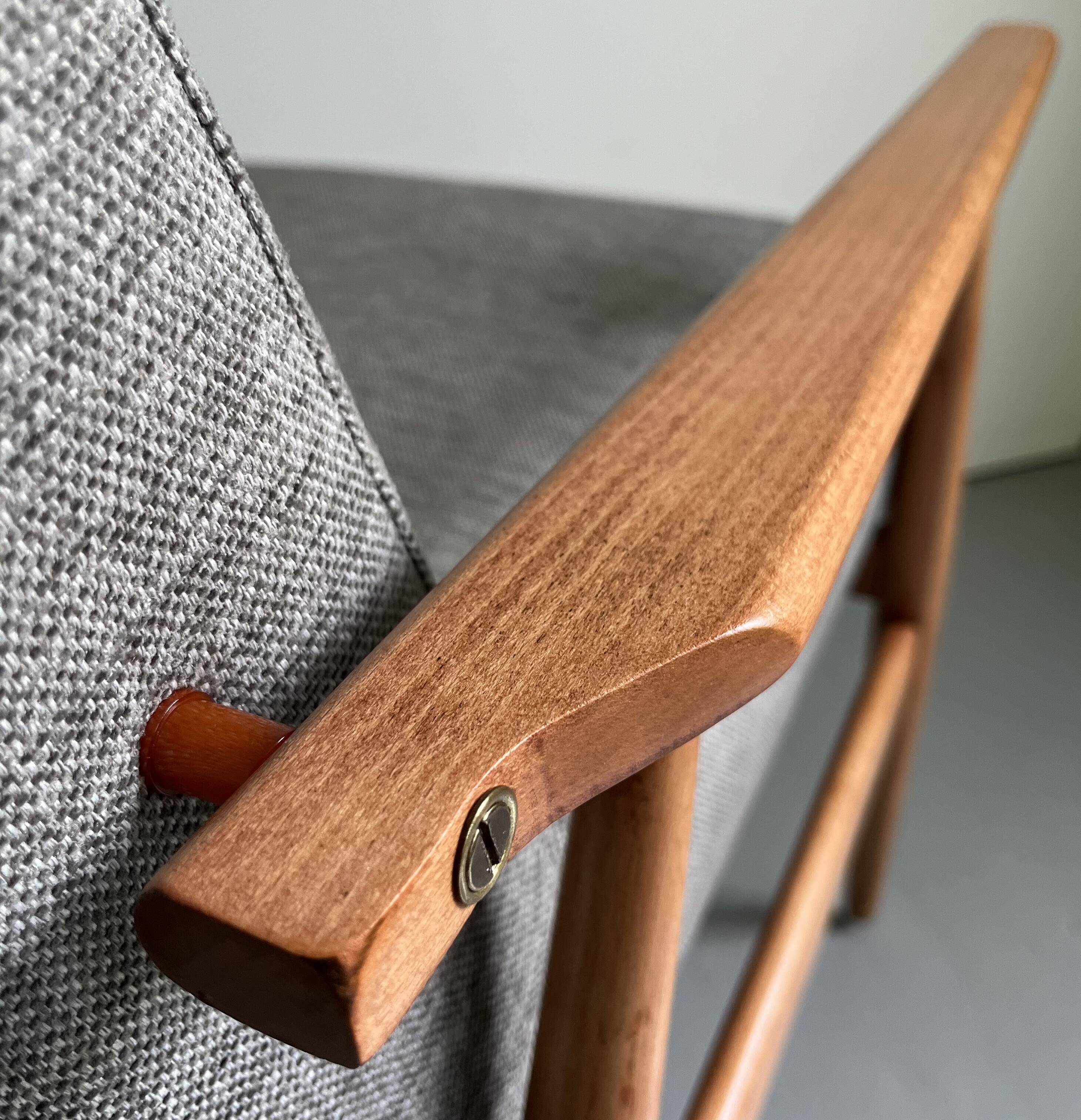 Gray fabric armchair type 300-190 by Polish designer H. Lis, 1960s