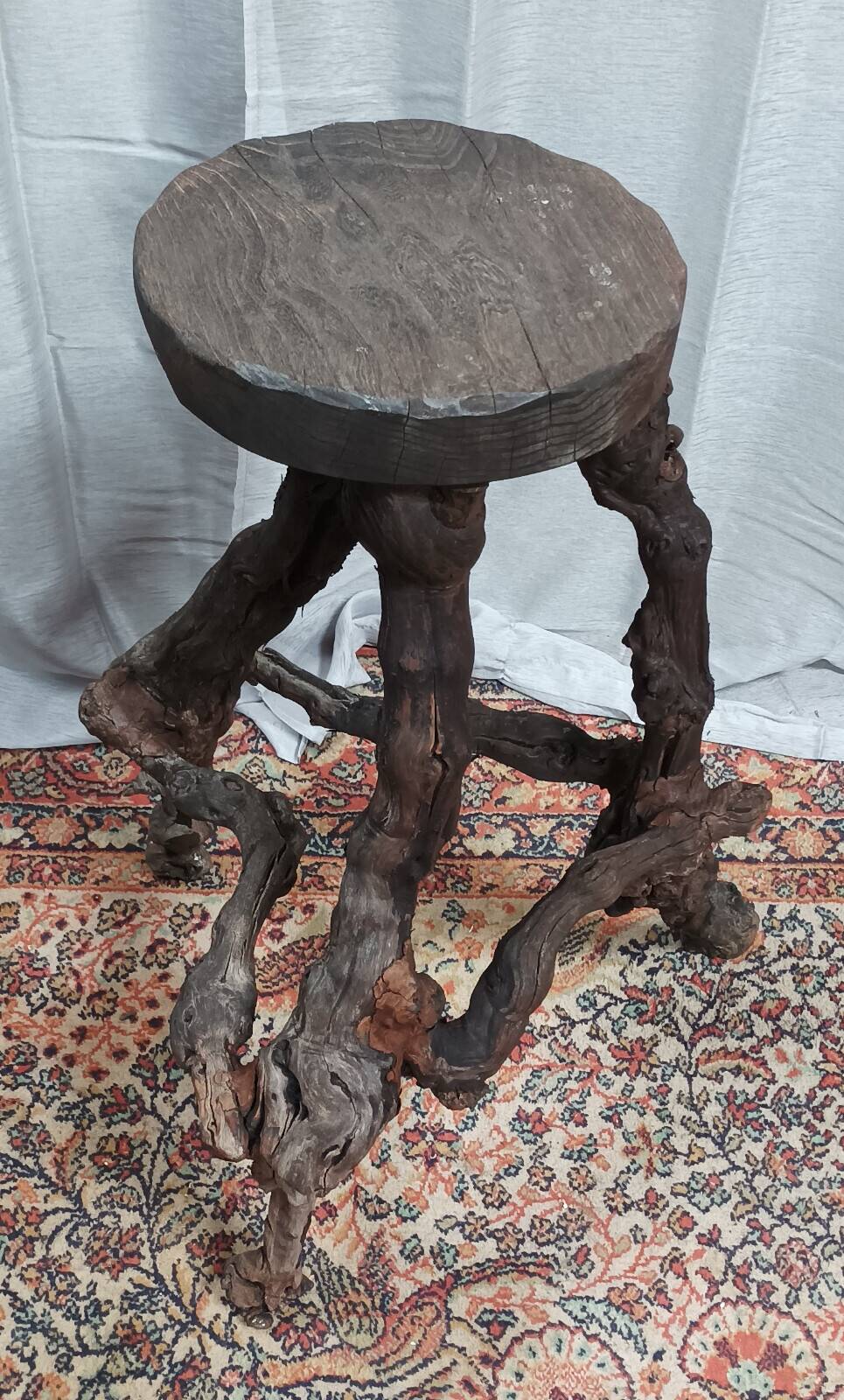 Brutalist bar stool made of vine wood