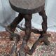 Brutalist bar stool made of vine wood