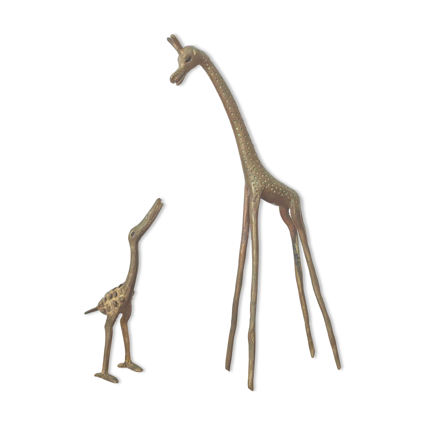 Giraffe and brass bird