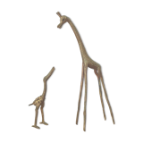 Giraffe and brass bird