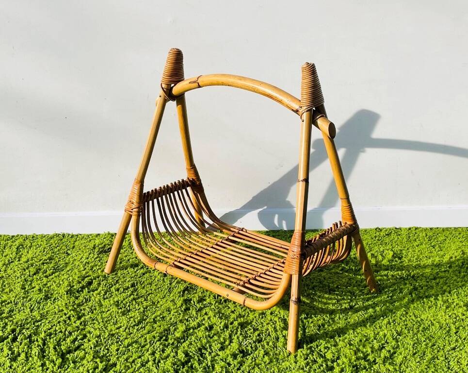 Vintage 1950s rattan magazine rack.