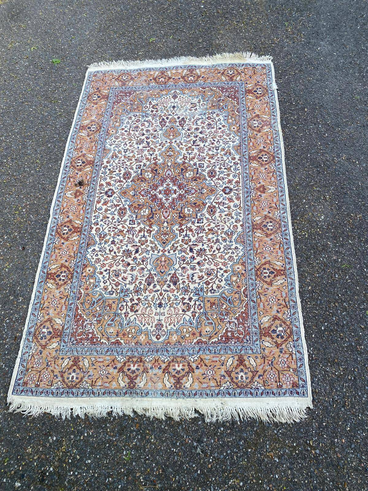 Handmade Persian rug in blue, beige, burgundy, and orange, 95x160cm.